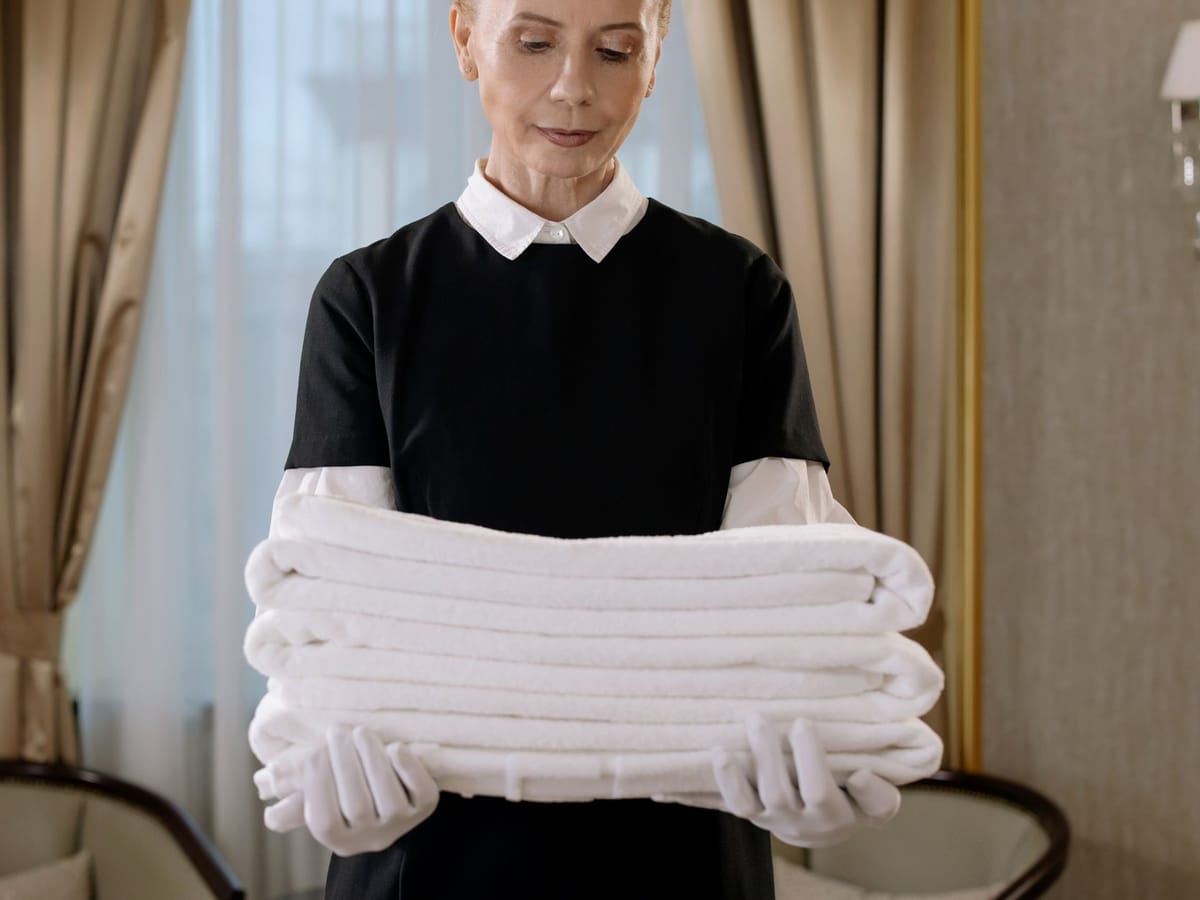 Stacked white towels, home textiles inspection